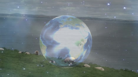 earth animation over scenic landscape with sheep grazing near water