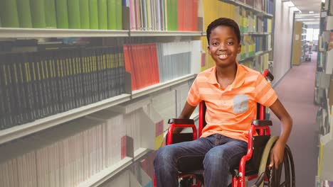 Animation-of-book-week-text-over-smiling-african-american-schoolboy-in-wheelchair-in-library