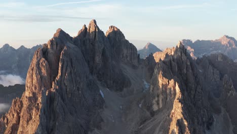 Aerial-view-of-Cadini-di-Misurina-Mountains-in-Dolomites-during-golden-sunrise