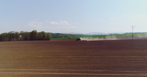 Tractor-Working-In-Beautiful-Spacious-Agricultural-Field-22