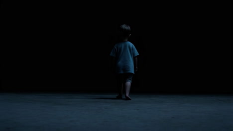 a lonely boy in the dark