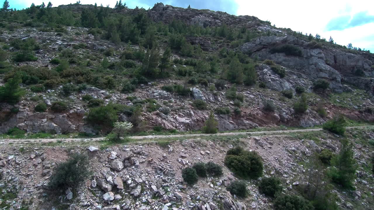 Drone takes you on a journey through Penteli's gravel road