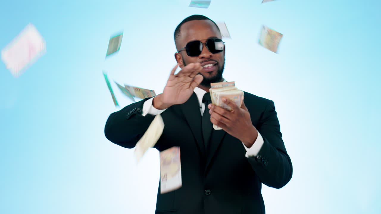 Happy businessman, money rain