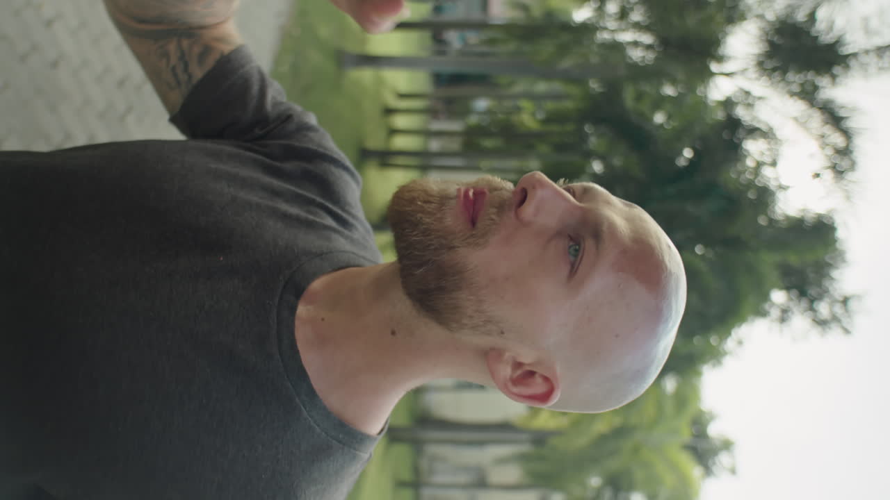 Man Drinking Water after Outdoor Workout