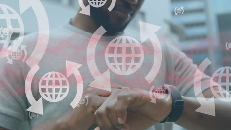 animation of data processing with icons over african american man checking smartwatch