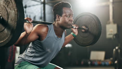 Hombre-Negro-En-El-Gimnasio,-Levantamiento-De-Pesas