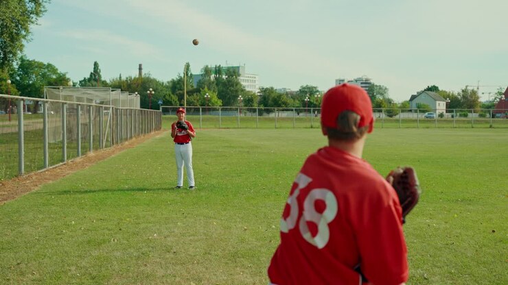 Giocatori di baseball sul campo