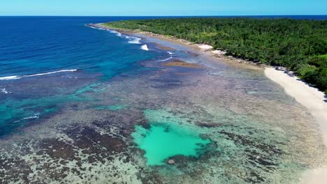 Aerial-drone-shot-of-holiday-destination-tropical-coral-reef-and-coastline-forest-Honeymoon-beach-travel-tourism-Port-Vila-Vanuatu-4K