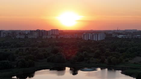 Aerial-View-Over-Vacaresti-Delta-At-Sunset,-Orange,-Yellow,-Bucharest,-Romania