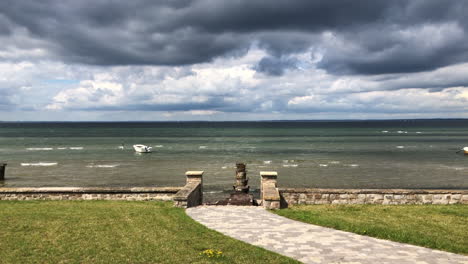 boat in a stormy ocean near the shore