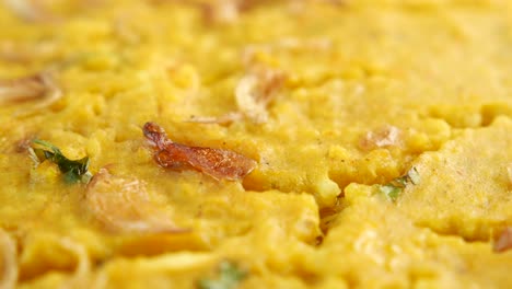 close-up of a yellow dal dish