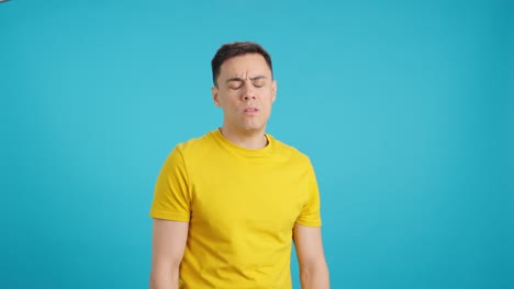 man in yellow shirt with emotional expressions