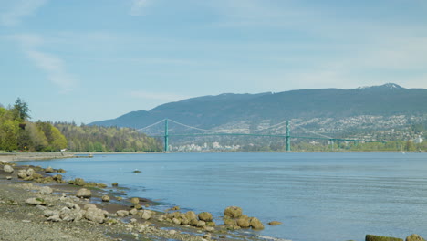 view on lions gate bridge on coast of stanley park