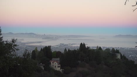 Airplane-Flies-Over-San-Francisco-Early-in-the-Morning