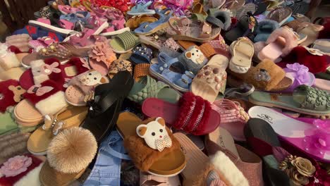 Close-up-shot-of-local-colorful-Bangladeshi-footwear-at-street-shop-in-Old-Dhaka