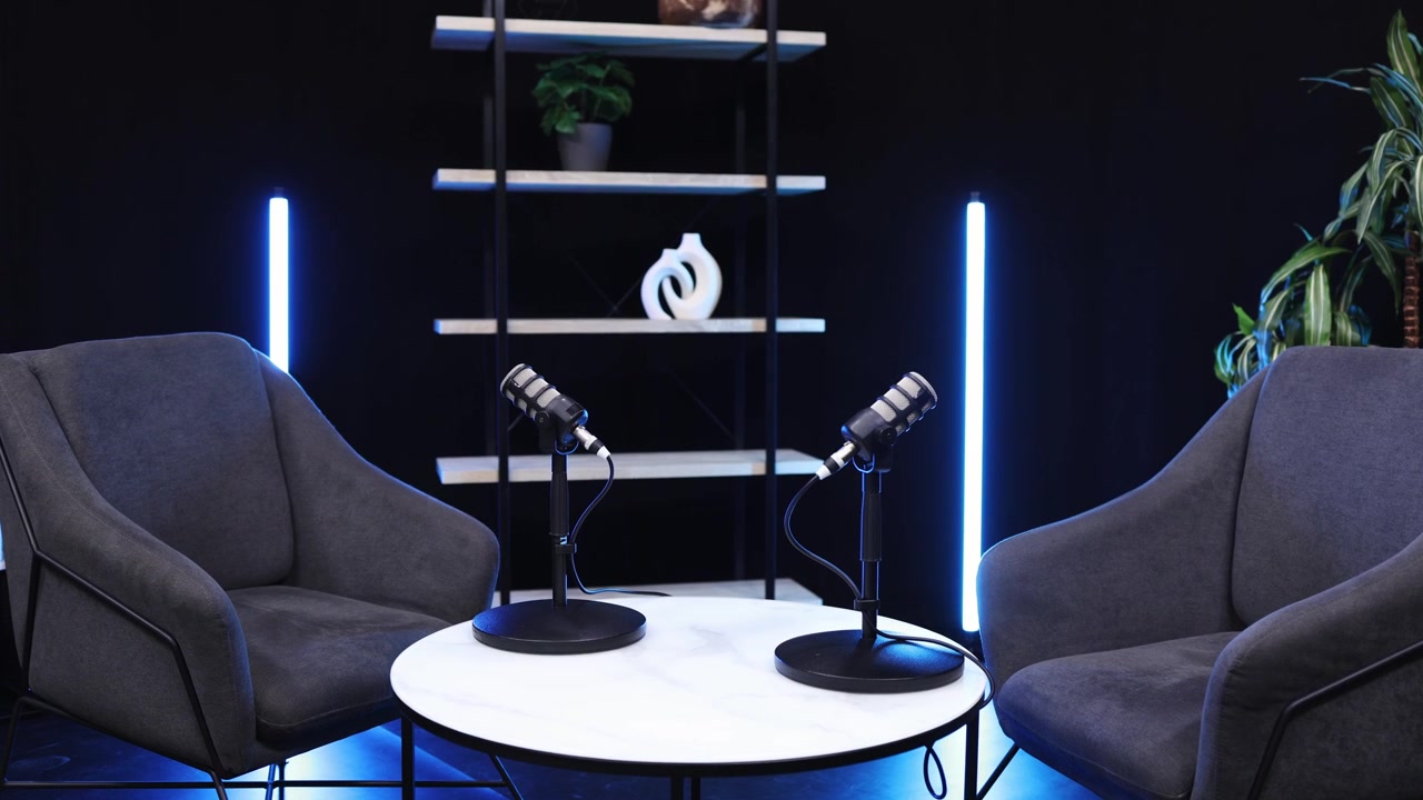 Empty Modern Podcast Studio Setup with Microphones and Chairs