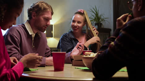 young friends talking at the party