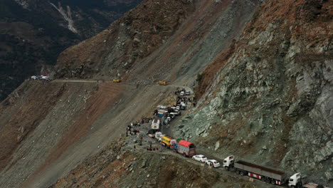 vehicles stuck at karakoram highway due to landslide in dasu, pakistan