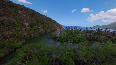 Fly-Over-Streams-Of-Valle-del-Rio-San-Juan-And-Tropical-Beach-In-Samana-Province,-Dominican-Republic