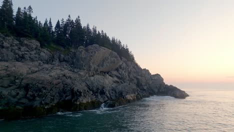 gorgeous close-up of sunlit rocks on maine's bold coast at dawn