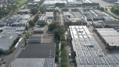 aerial of truck driving over road on industrial terrain