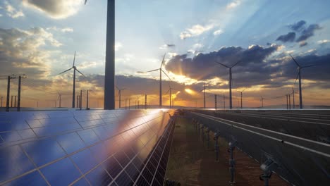 sunset over a sustainable energy farm