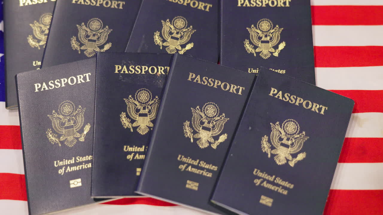 Multiple United States Passports on an American Flag