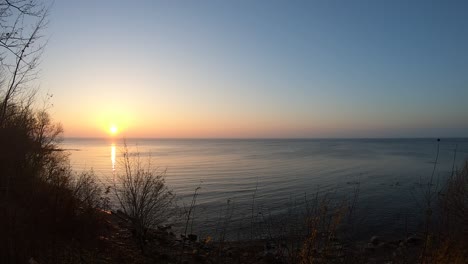 Zeitraffer,-Sonnenuntergang-über-Dem-Kurischen-Haff