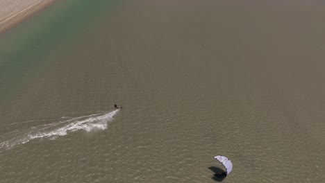 Top-down-shot-of-a-kitesurfer-in-the-Tatajuba-lagoon-in-Brazil