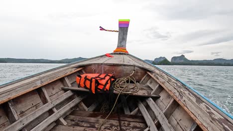 boat travels through scenic krabi waters