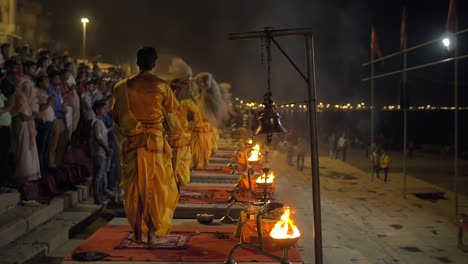 nighttime ceremony being performed in varanasi