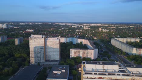 fantastic aerial top view flight panel system building, prefabricated housing complex, berlin marzahn east germany golden hour 2023