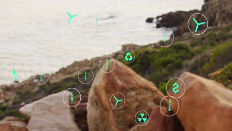 animación de iconos de sostenibilidad y ecología sobre el paisaje