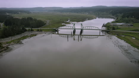 The-Bullards-Bridge-is-a-vertical-lift-bridge-that-spans-the-Coquille-River-near-where-the-river-empties-into-the-Pacific-Ocean,-just-north-of-Bandon,-Oregon,-United-States