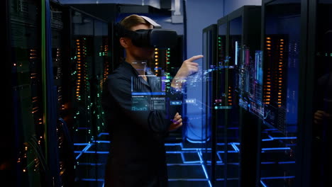 man using virtual reality to manage data in a server room