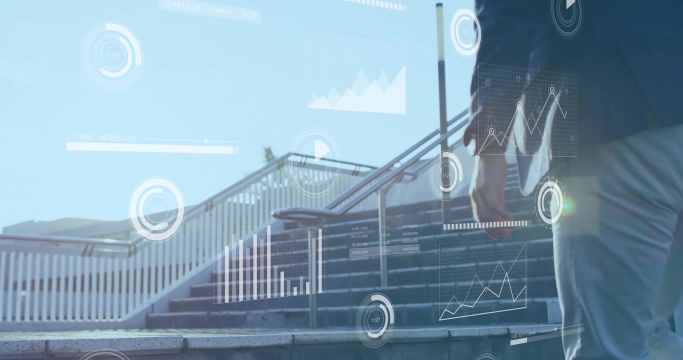 mature adult male stepping upward initiating technology data visuals on steps showing progress