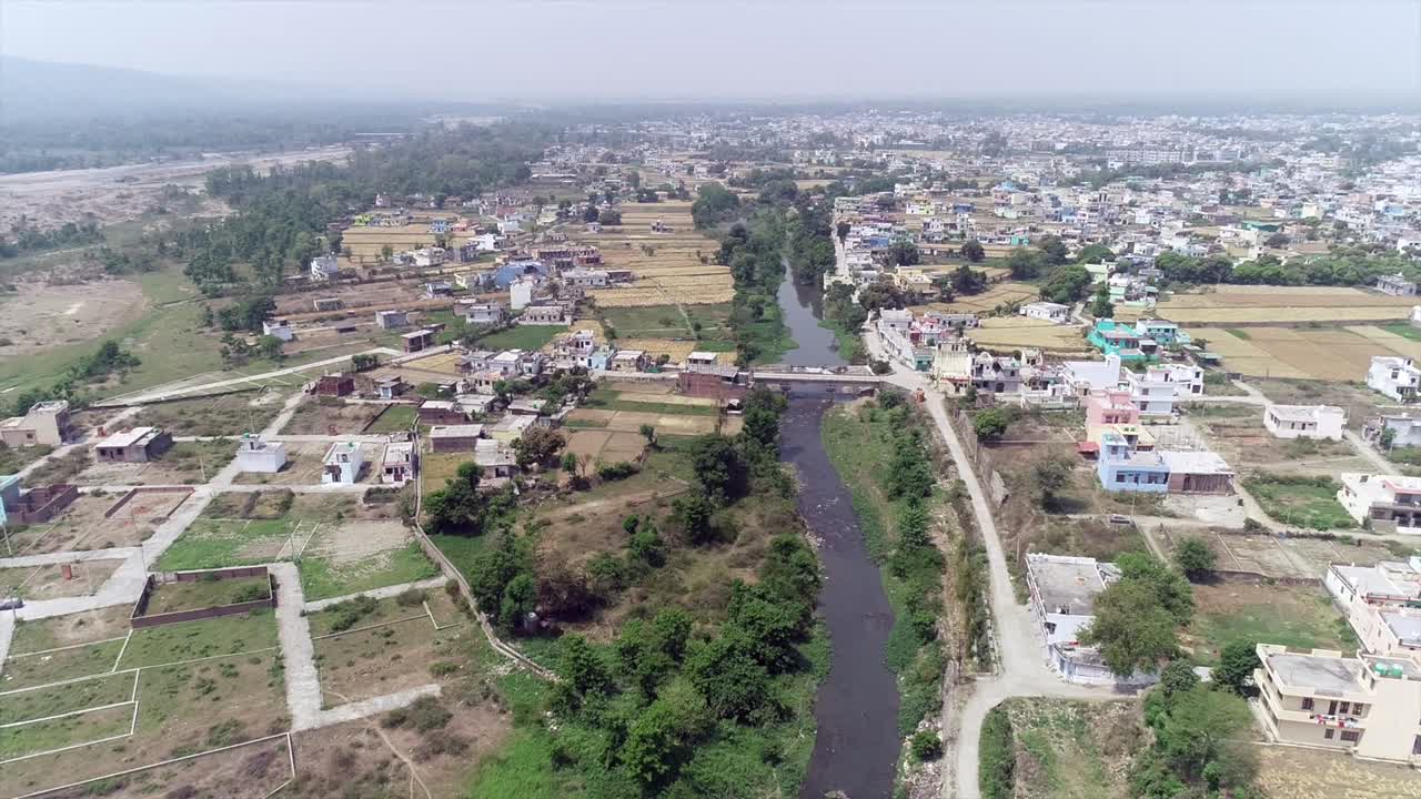 drone shoot in Dehradun Uttarakhand , rural India aerial view footage for fee stocks Clip