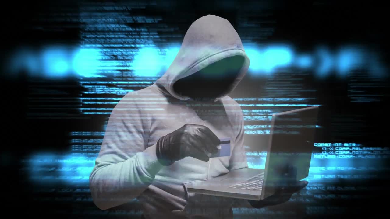 animación digital de un hacker encapuchado usando el portátil 4k