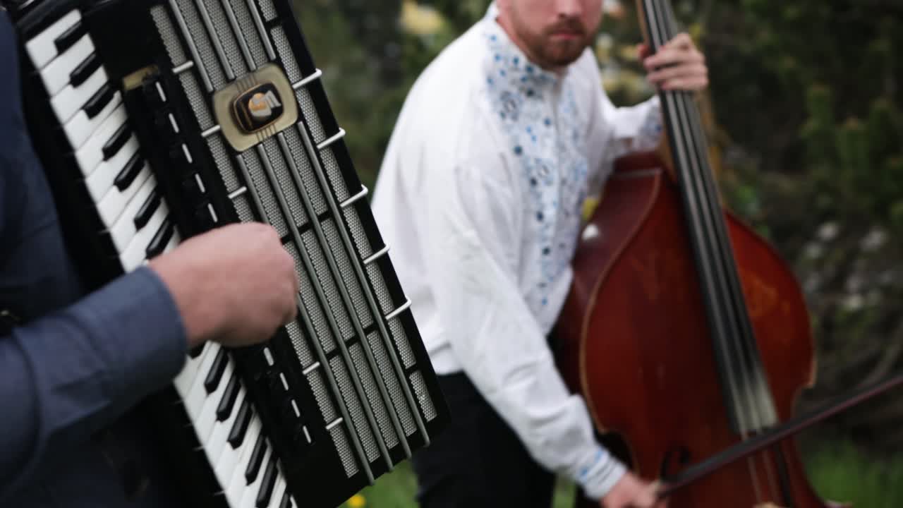 Folk Band Playing High Energy Song Accordion And Contrabass, Medium