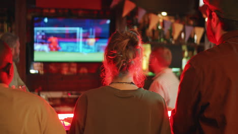 group of people watching football match