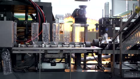 conveyor in the factory for the production of plastic bottles.
