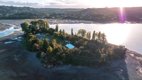 Aerial-hyperlapse-of-Isla-Aucar,-the-floating-cemetery,-with-scenic-views-at-golden-hour