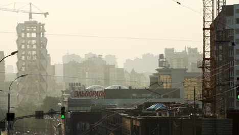 cityscape with construction and fog