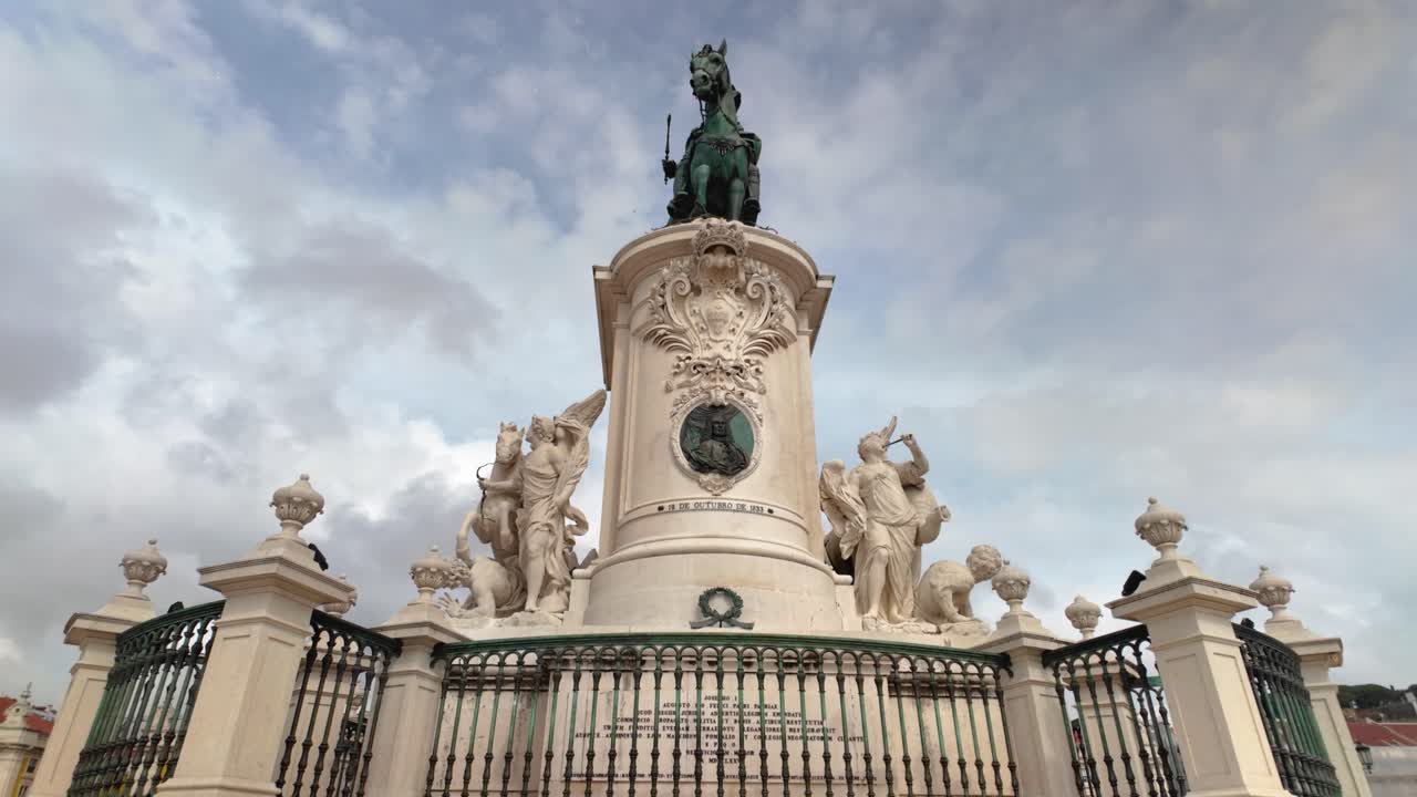 Monument in Praça do Comércio Lisbon on cloudy day
