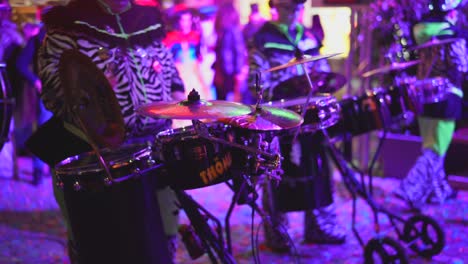 drummer playing drum kit on carnival event outdoor in the city,static shot