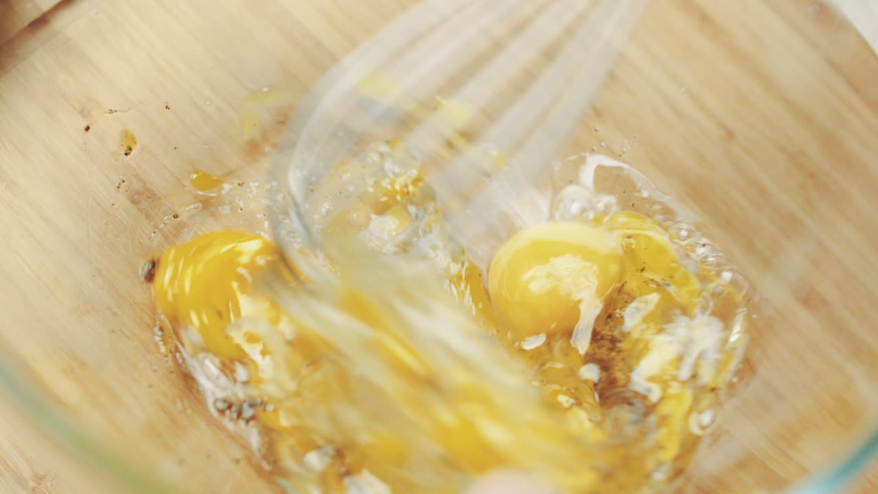 Beating Raw Eggs in Kitchen Prep