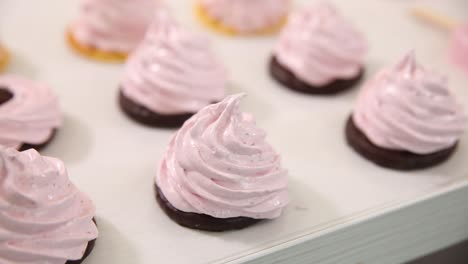 pink marshmallow treats on a tray