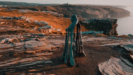 aerial view around the monument to king arthur in britain monument close up on sea background