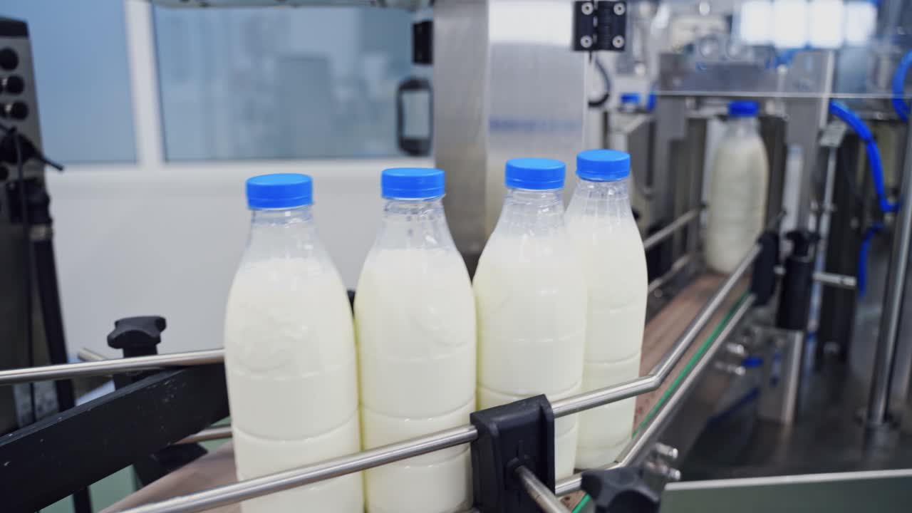 Plastic bottle on the conveyor. Plastic bottles transported on conveyor, automated production line