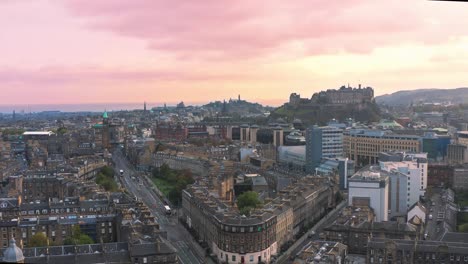 edinburgh drone establisher aerial, view of castle, golden sunset sky